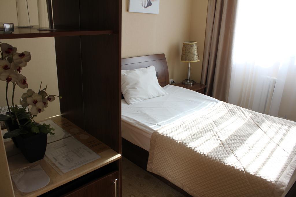 Akbulak Hotel Астана Стая снимка
