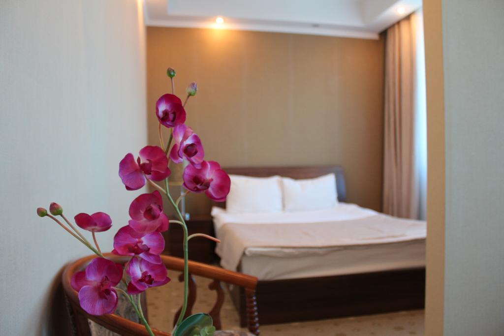 Akbulak Hotel Астана Стая снимка
