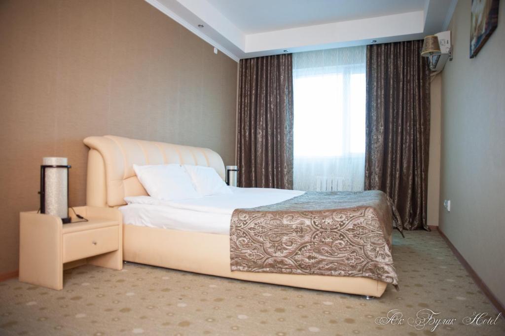 Akbulak Hotel Астана Стая снимка